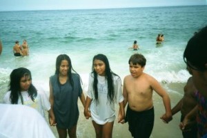 Holding hands at beach